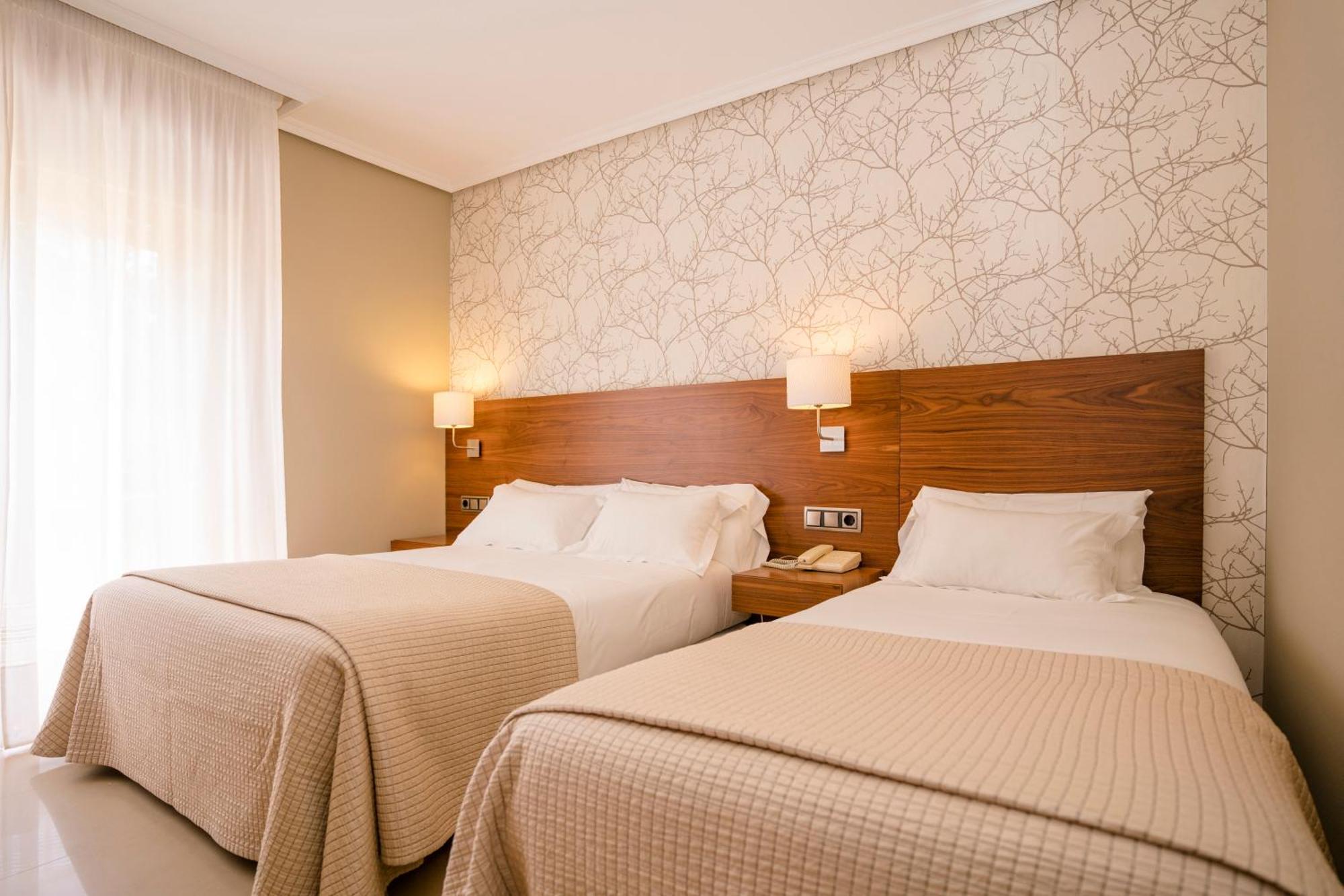 Hotel Piramide Portonovo Pokoj fotografie
